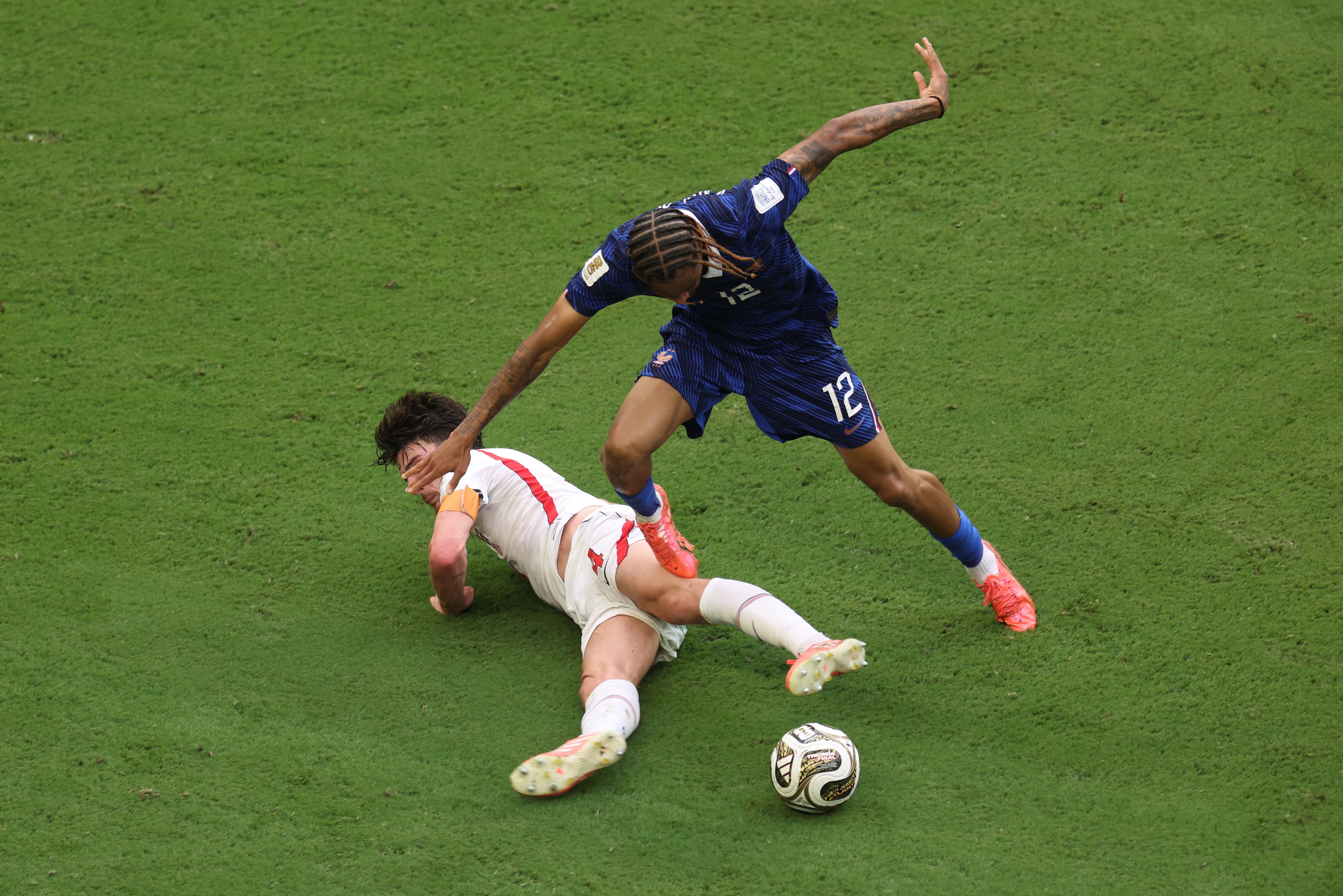 Liverpool transfer target Bradley Barcola battles with an England player.