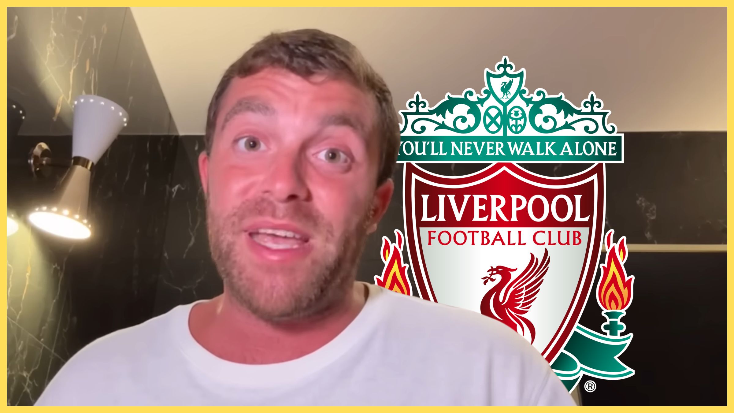 Transfer news expert Fabrizio Romano speaks in hotel room next to Liverpool club badge.