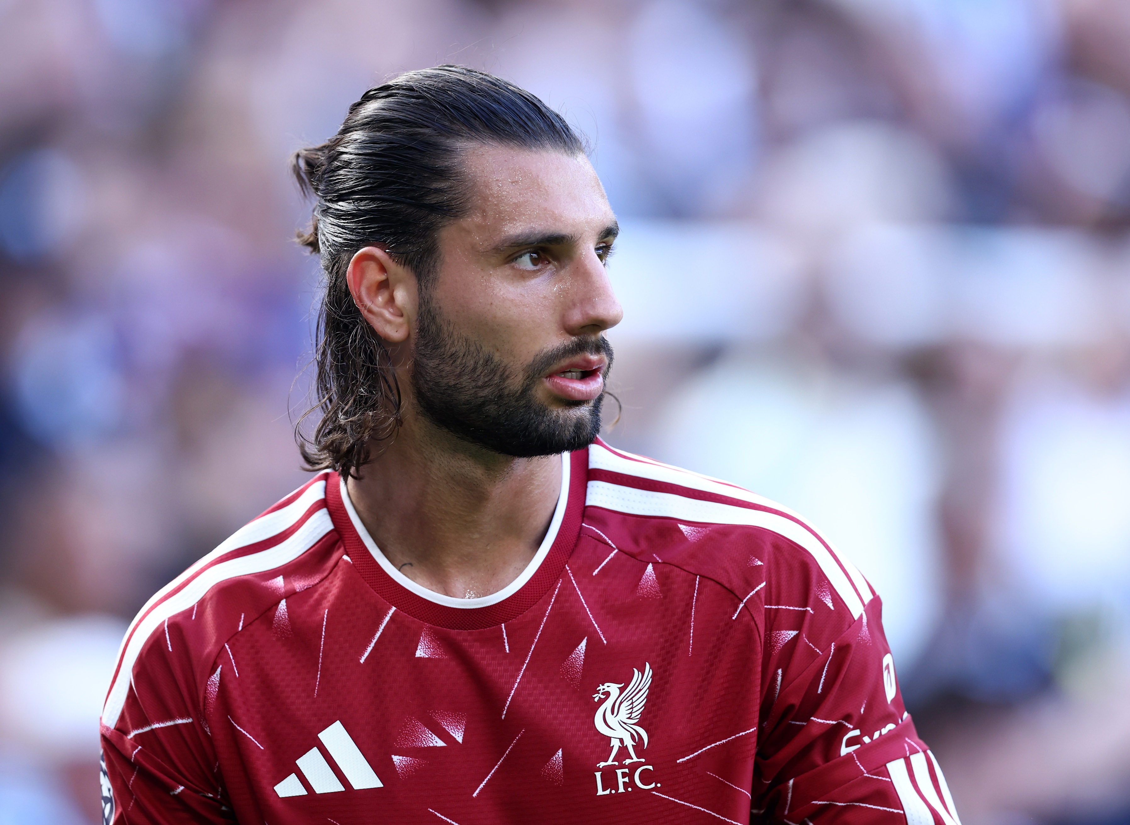Dominik Szoboszlai looks on during Liverpool game.
