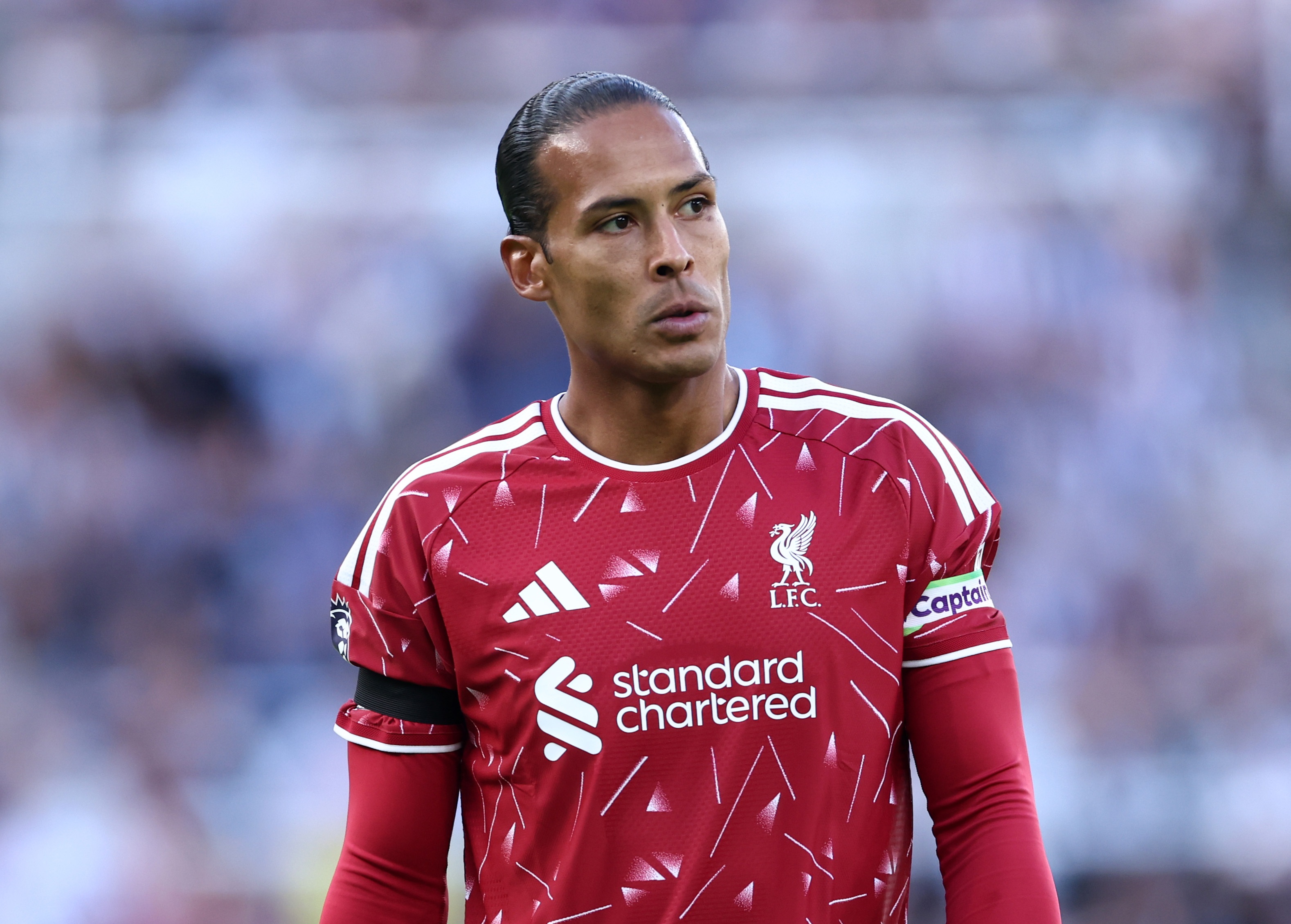 Virgil van Dijk looks on during Liverpool v Newcastle game in the Premier League.