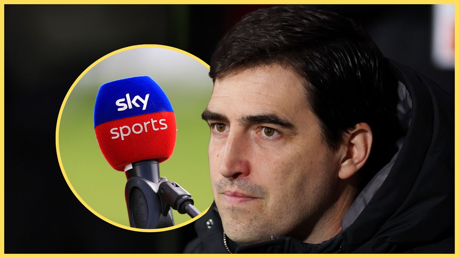 Liverpool manager Andoni Iraola looks on next to Sky Sports microphone.