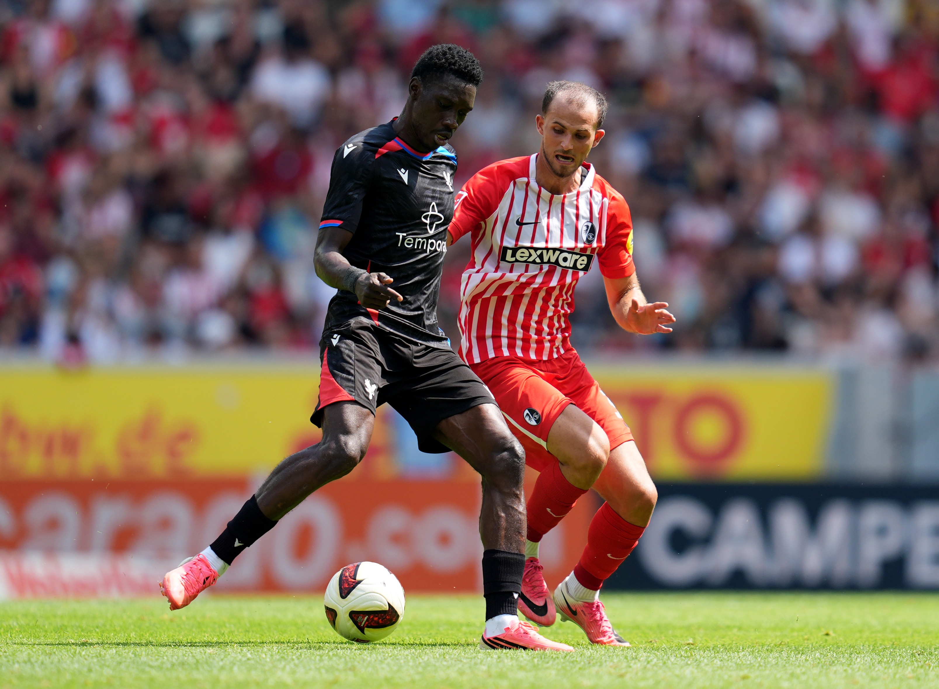 Ismaila Sarr dribbles during Crystal Palace friendly.