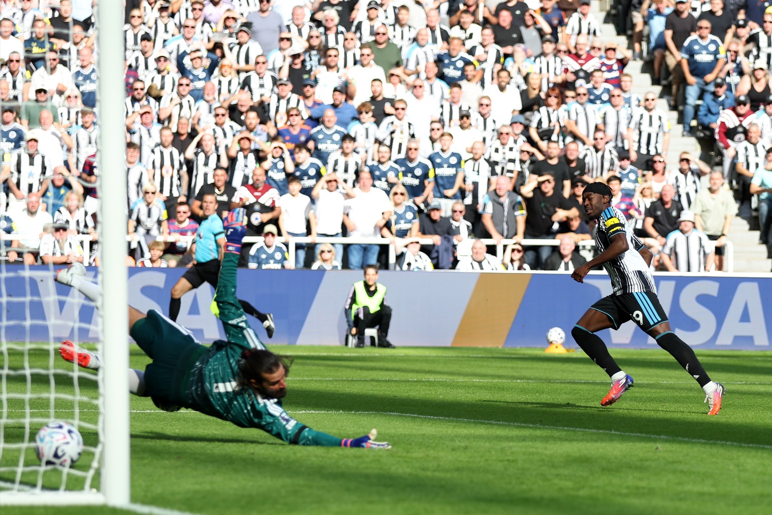 Anthony Elanga scores past Alisson Becker to give Newcastle an early lead
