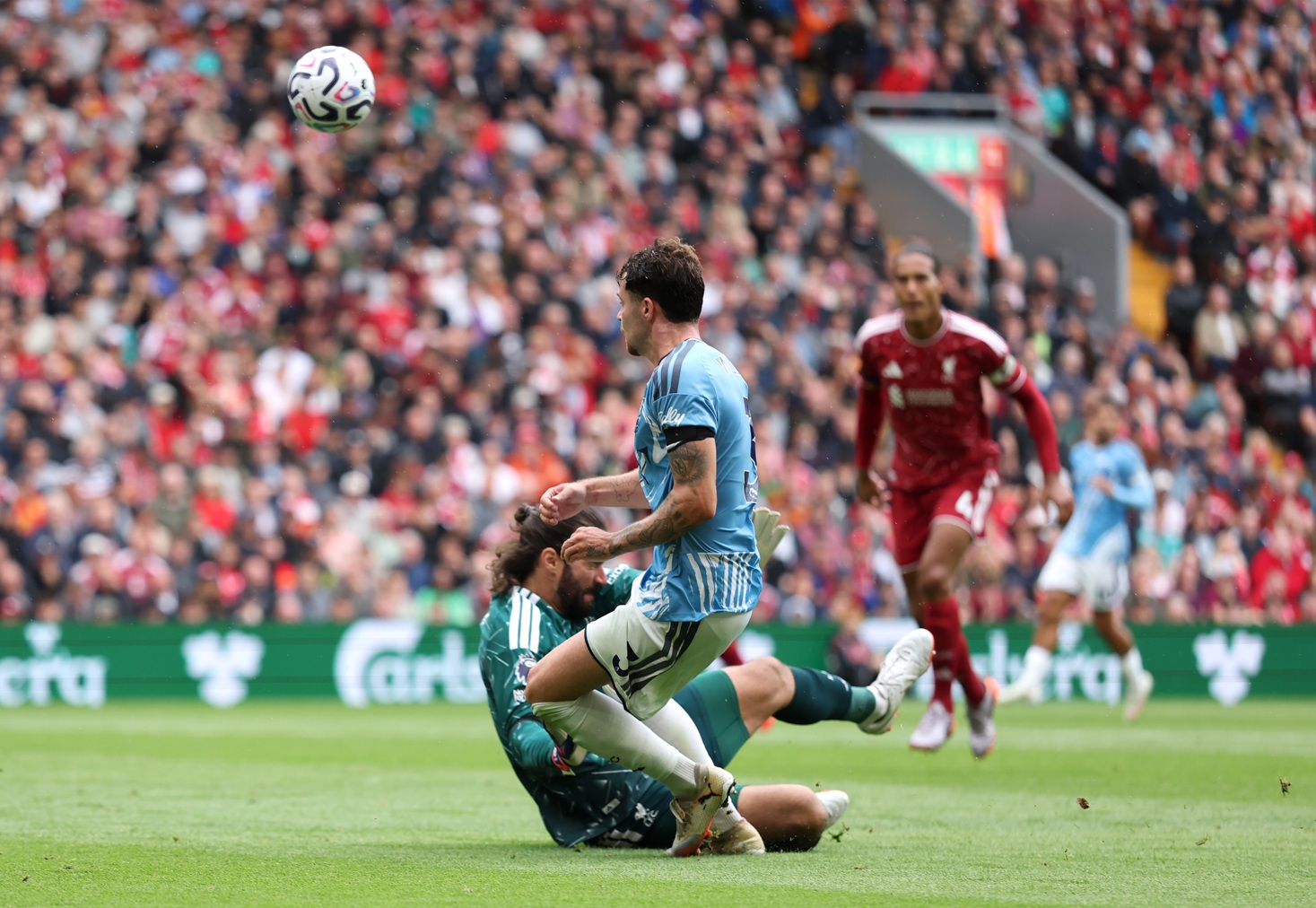 Alisson Becker is adjudged to have fouled Neco Williams, with Nottingham Forest awarded a penalty