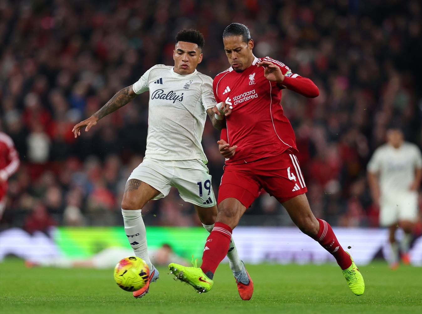 Igor Jesus and Virgil van Dijk compete for possession