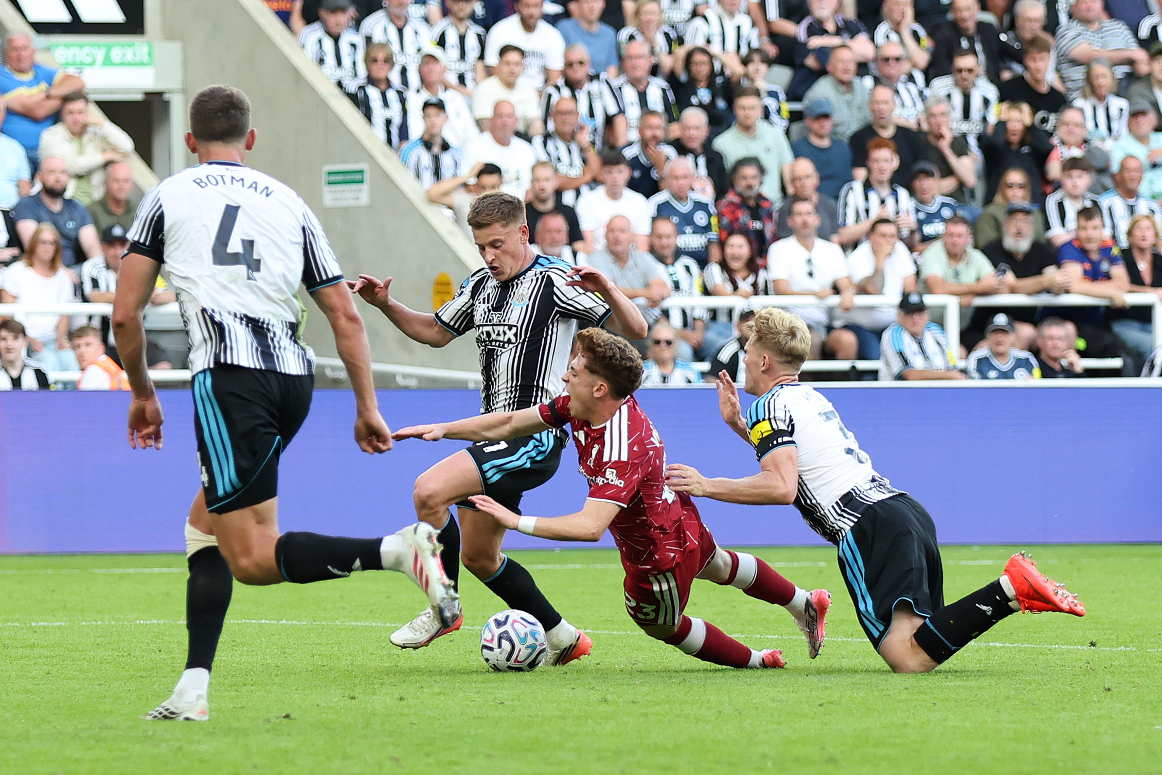 Lewis Hall fouls Victor Munoz and gives away a stoppage-time penalty