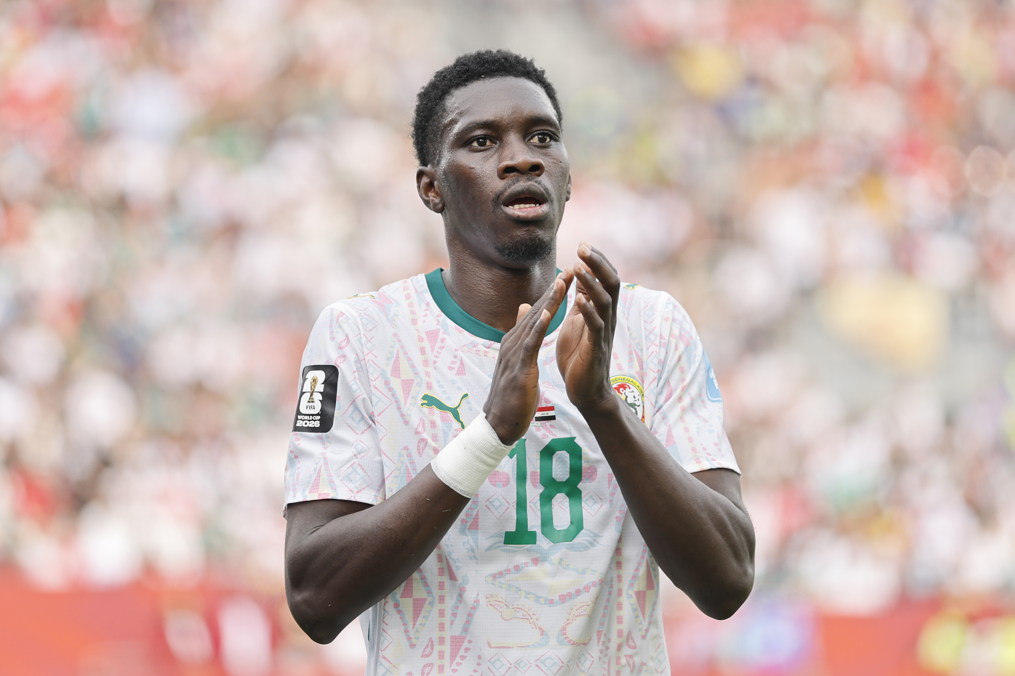 Ismaila Sarr applauds after Senegal's win over Iraq at the World Cup