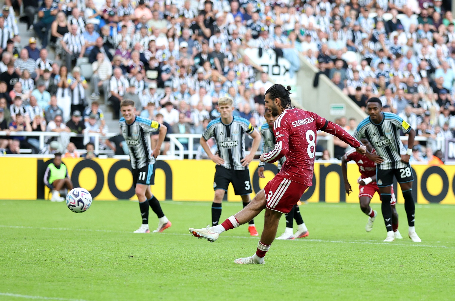 Dominik Szoboszlai scores from the spot to secure a draw for Liverpool at Newcastle