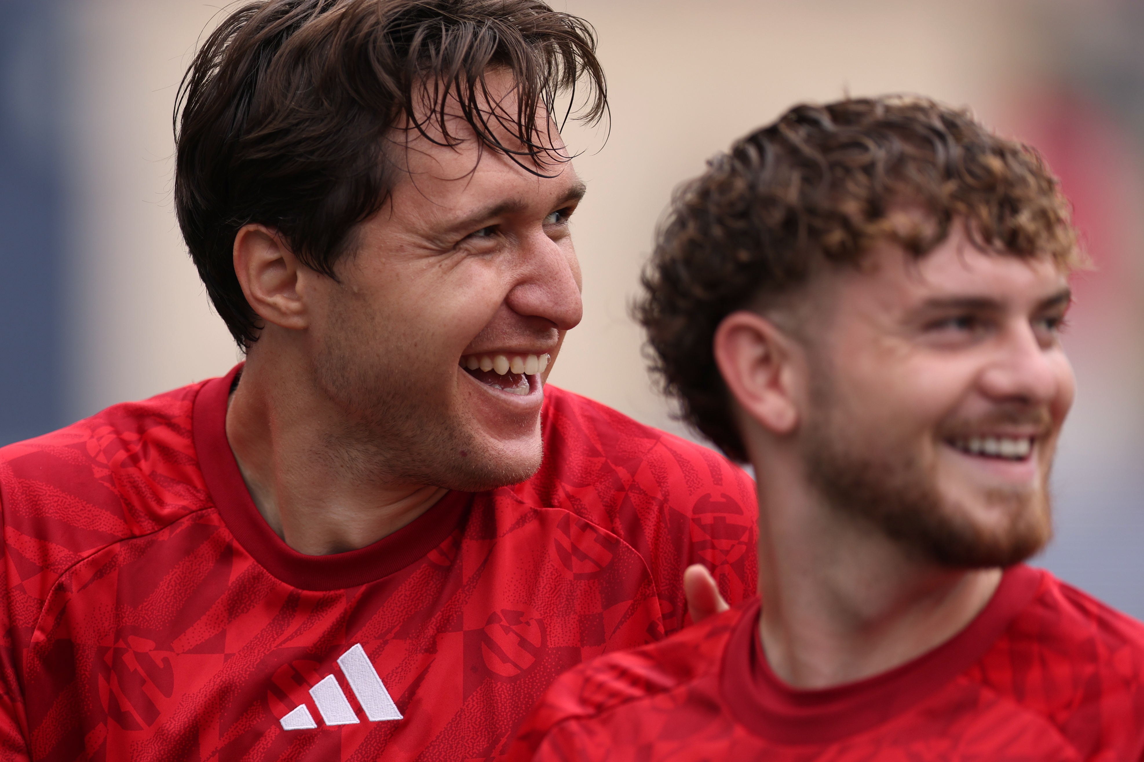 Federico Chiesa laughs next to Liverpool teammate Harvey Elliott.