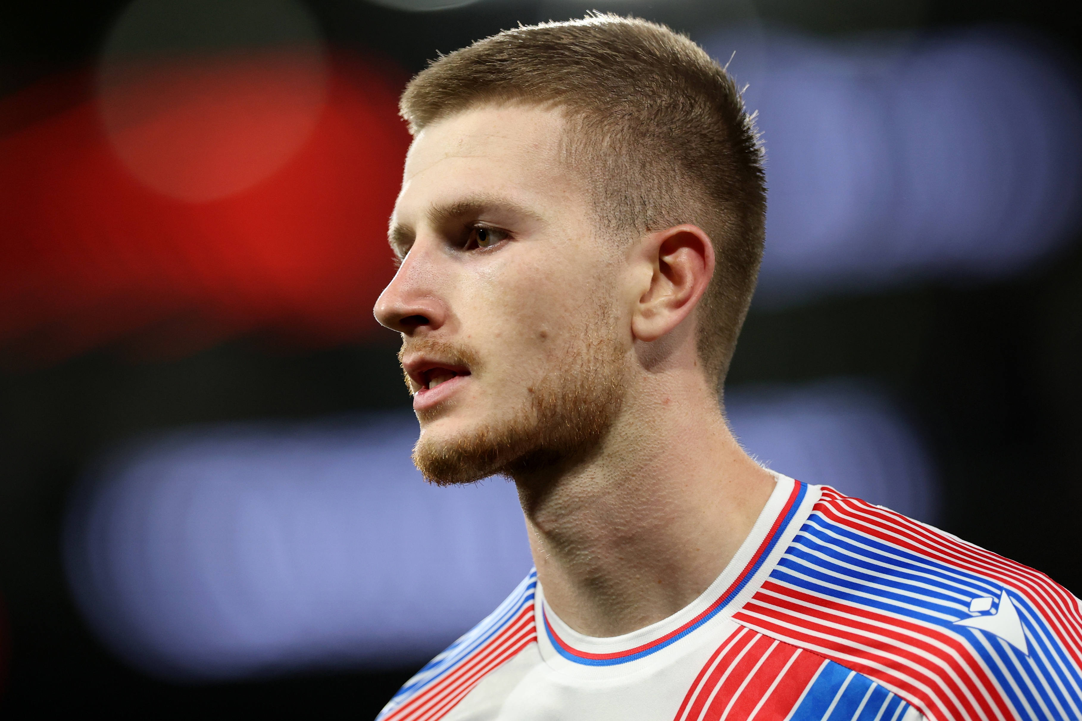 Adam Wharton looks on during Crystal Palace game.