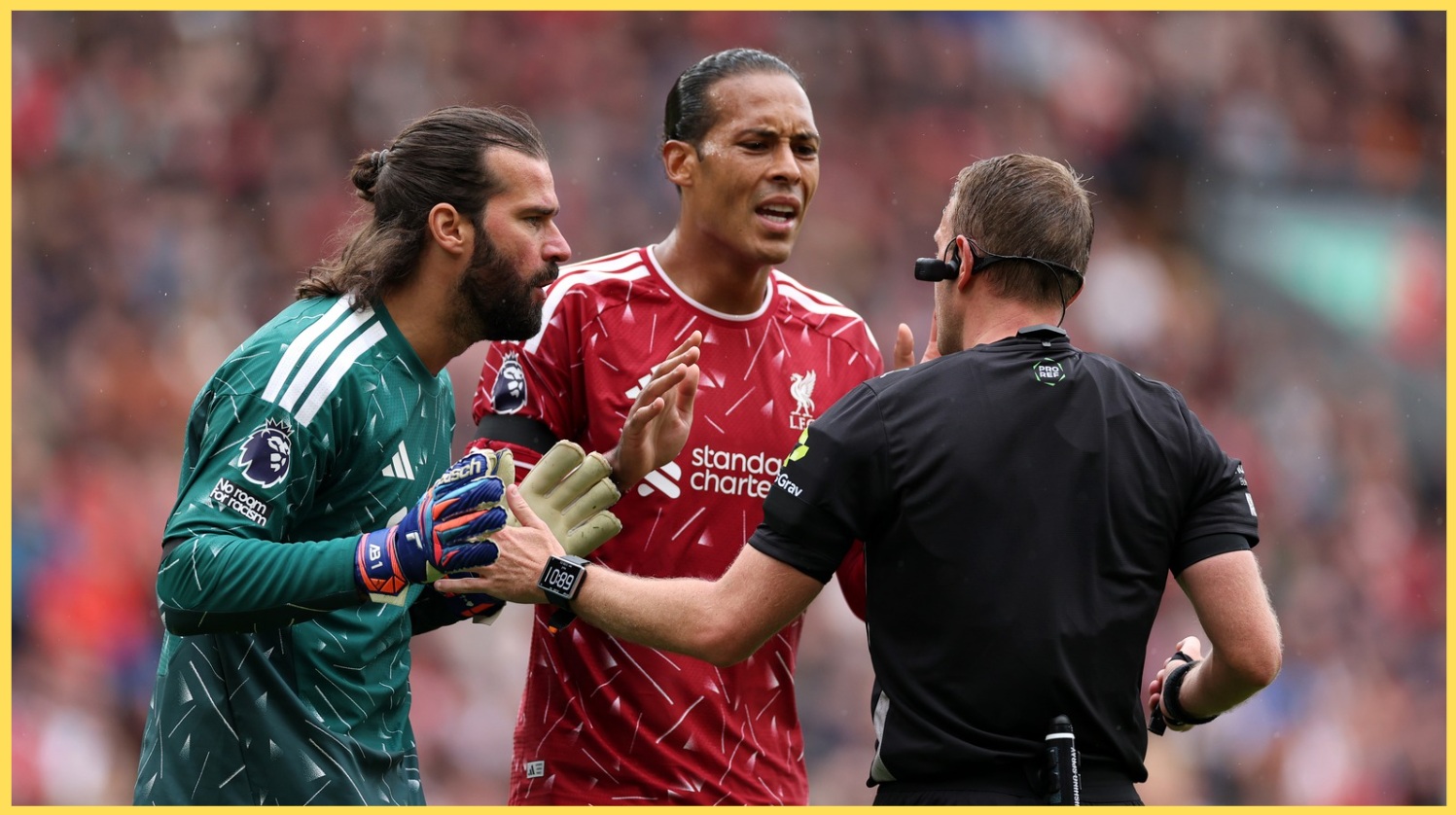 Alisson Becker and Virgil van Dijk remonstrate with Sam Barrott