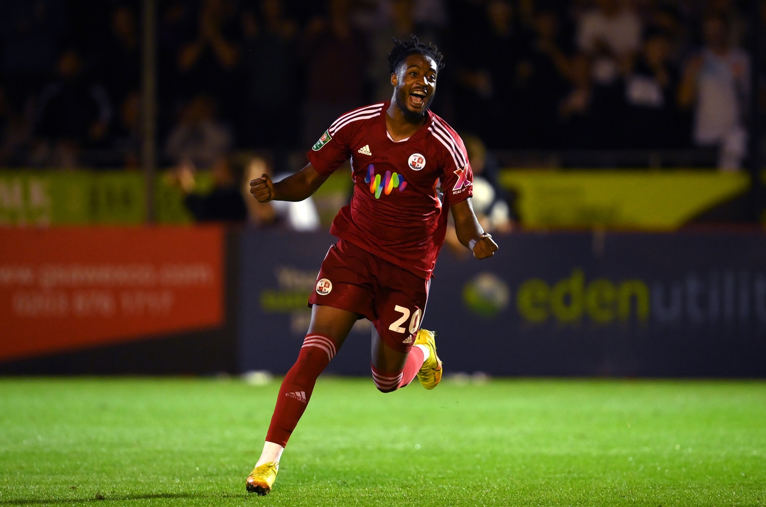 James Balagizi celebrates scoring for Crawley in 2022