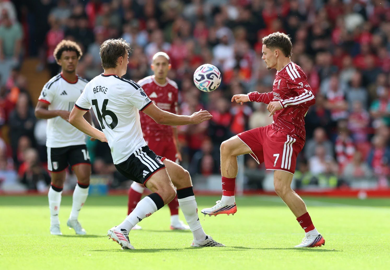 Sander Berge and Florian Wirtz contest a duel for possession