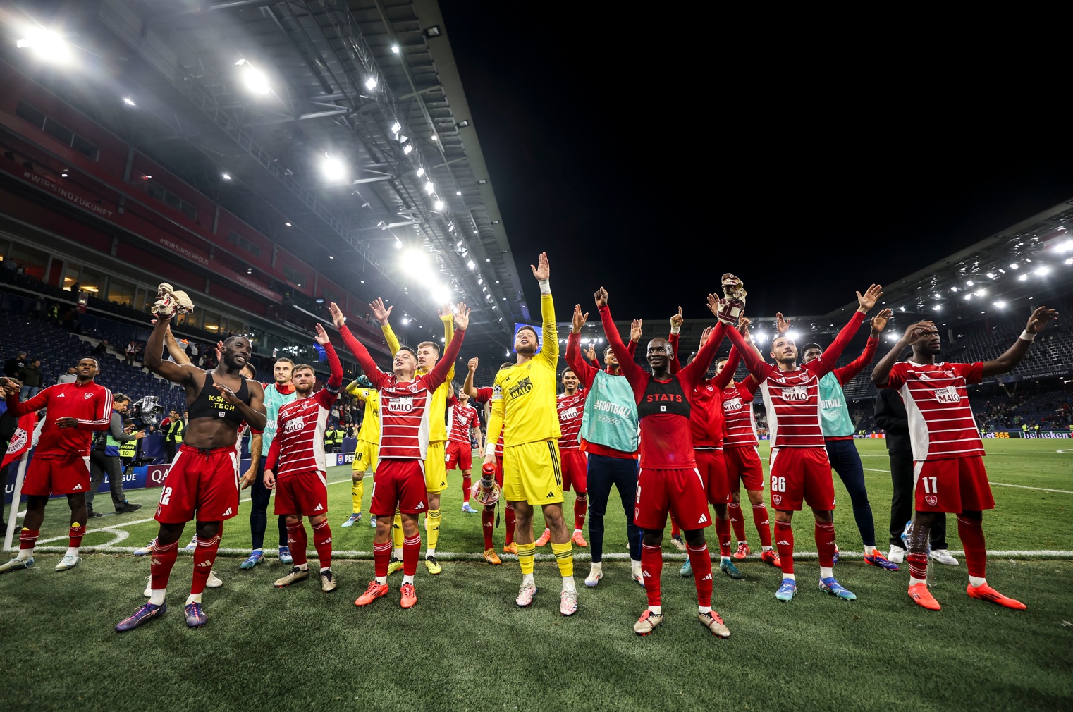 Brest players celebrate after a win in the Champions League