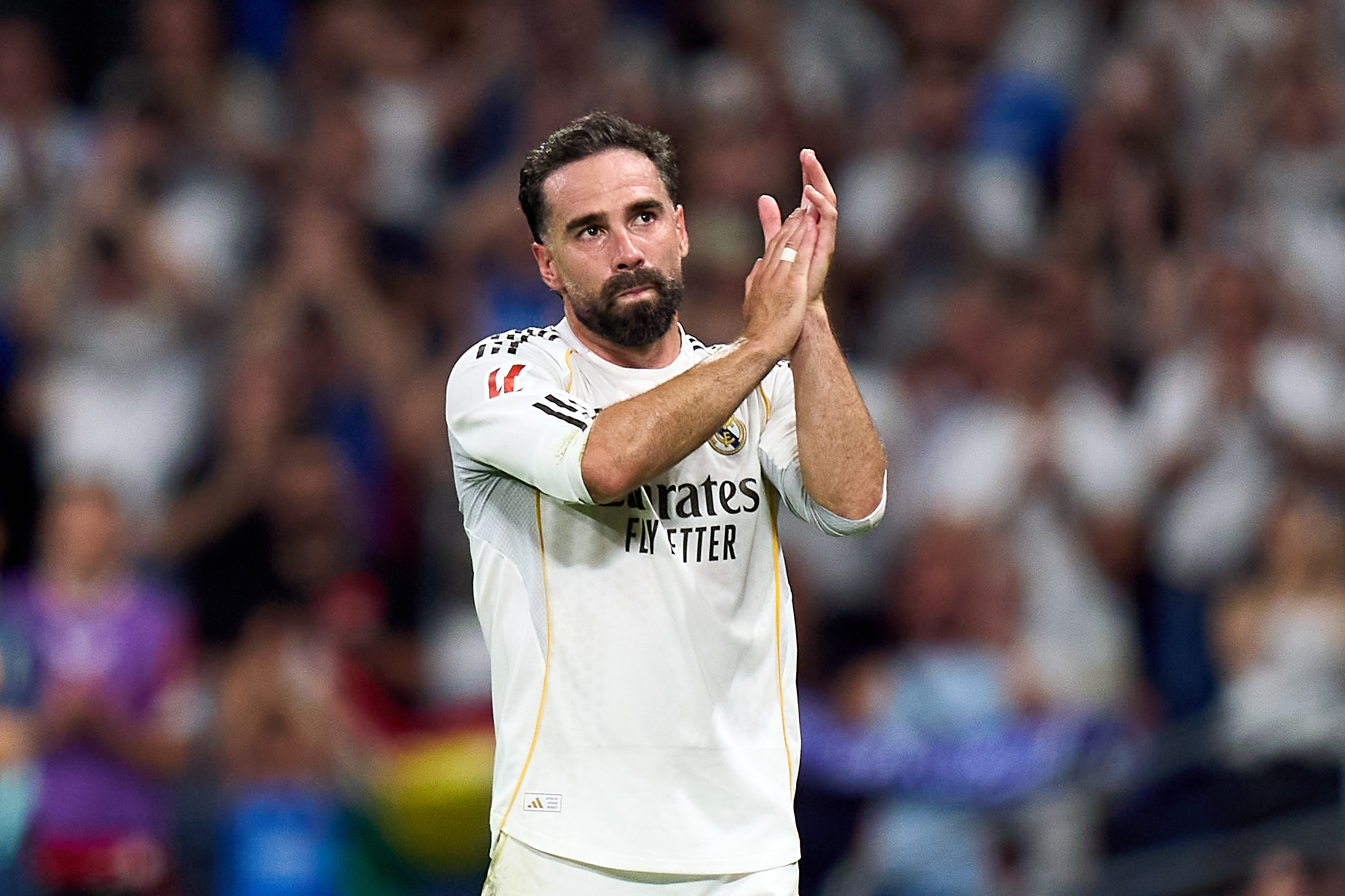 Dani Carvajal applauds Real Madrid fans after his final match for the club