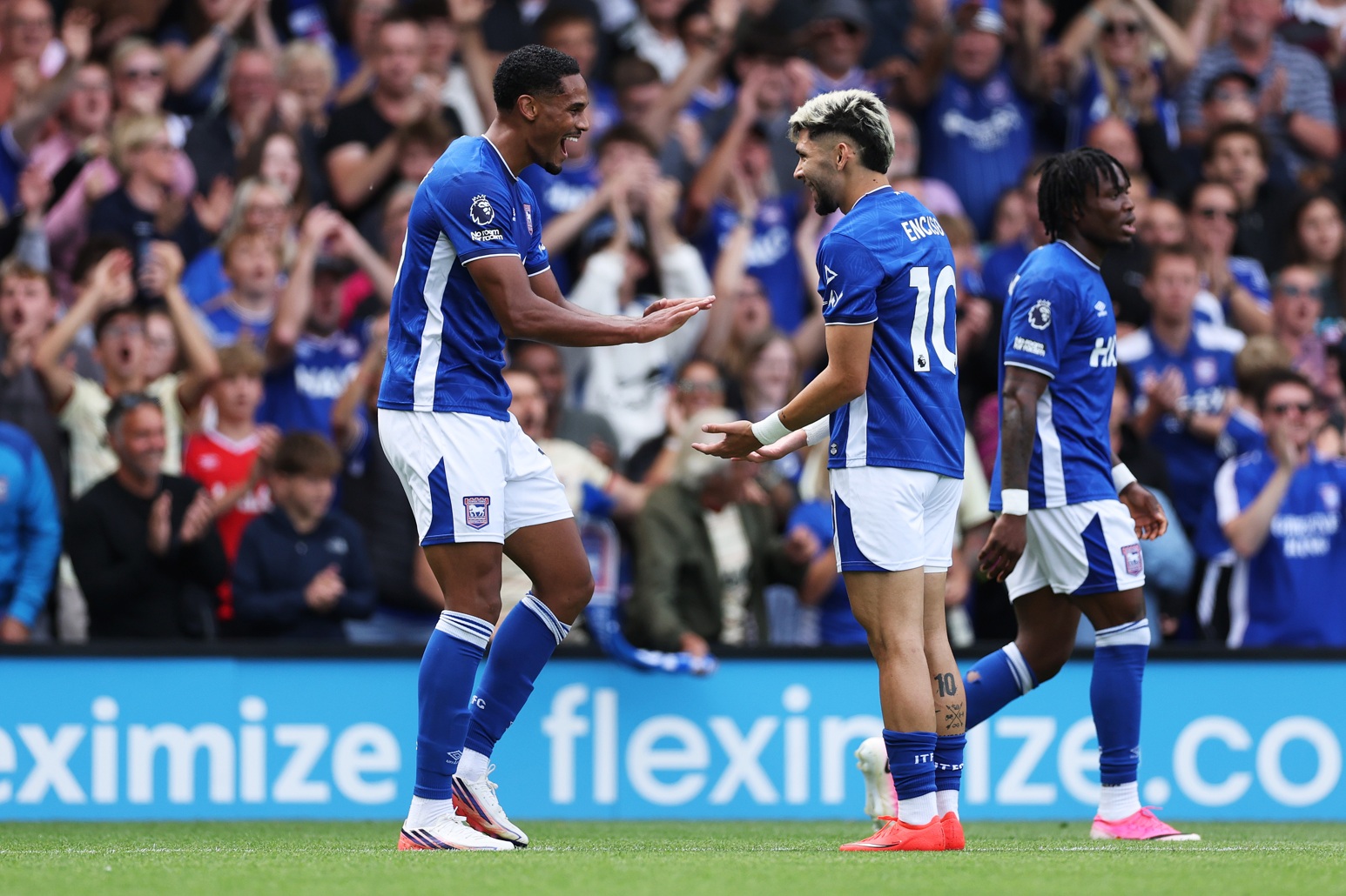 Ipswich striker Emersonn celebrates with teammate Julio Enciso