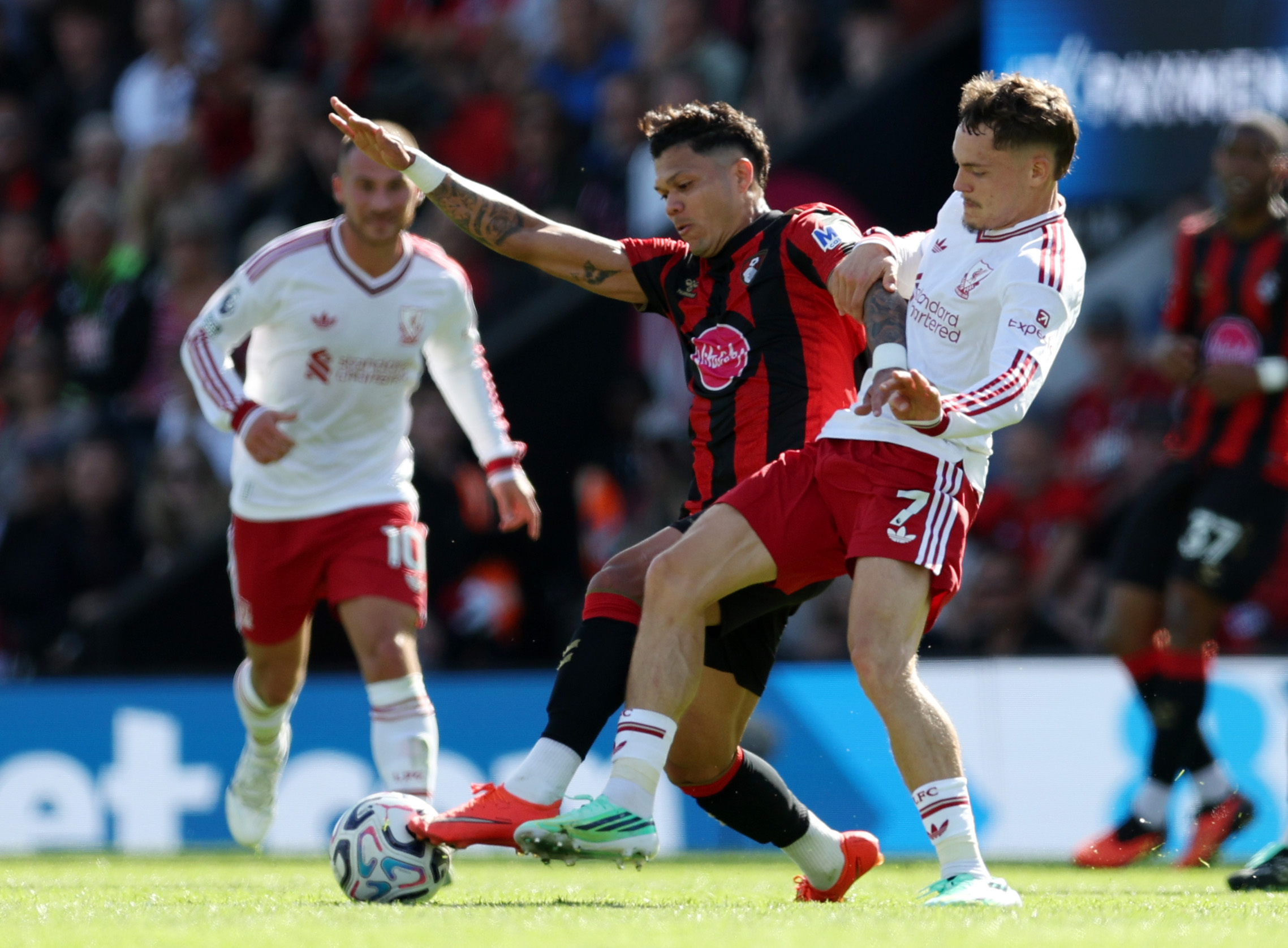 Florian Wirtz challenges Evanilson during Liverpool's win over Bournemouth