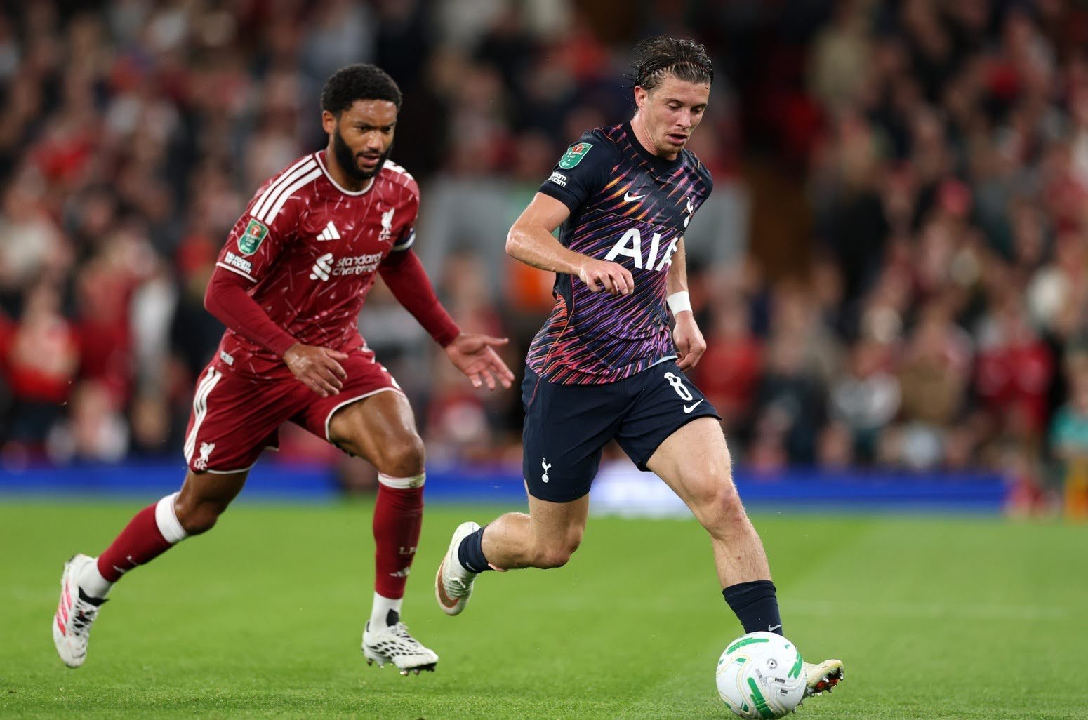 Joe Gomez chases down Conor Gallagher