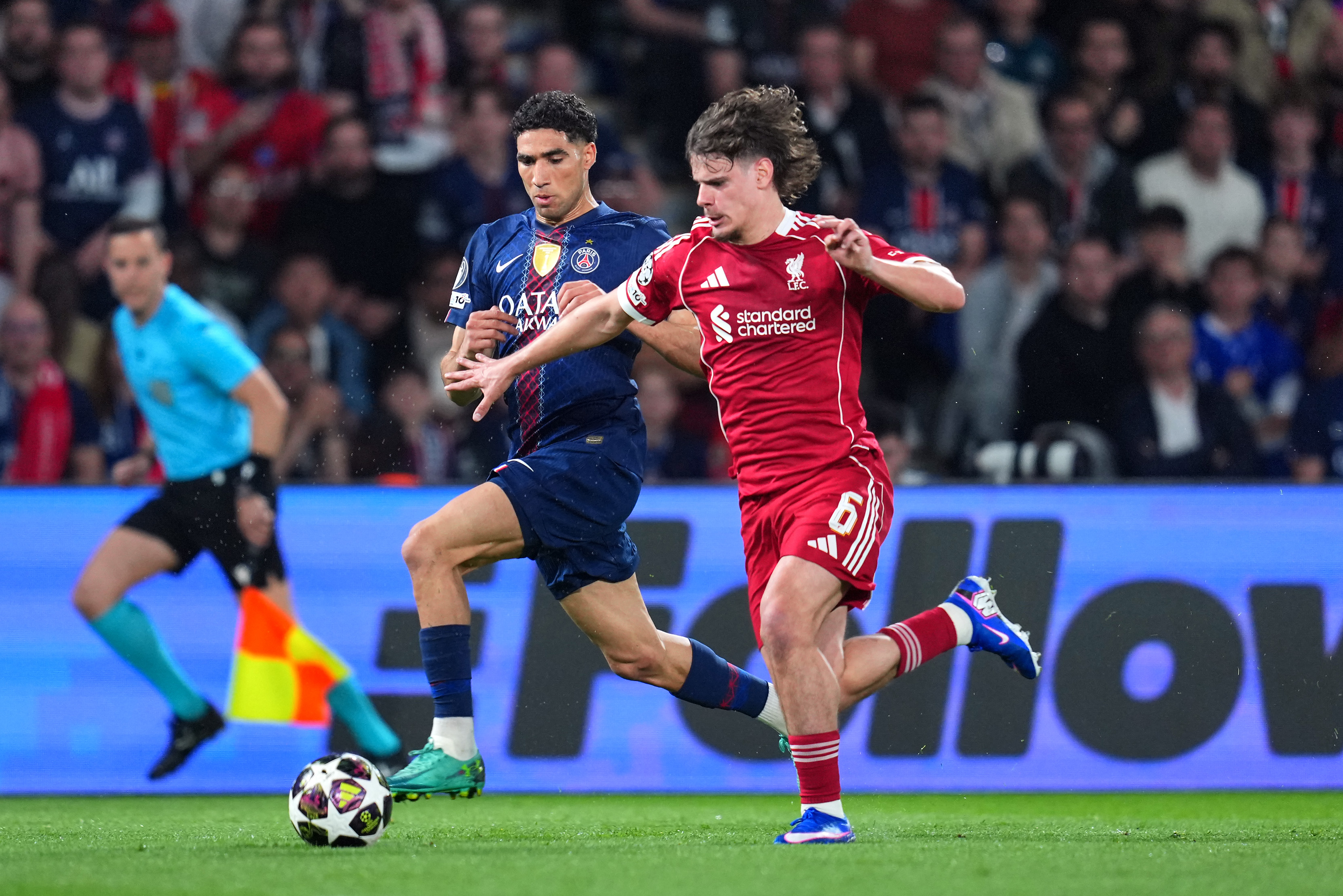 Milos Kerkez attempts to hold off Achraf Hakimi