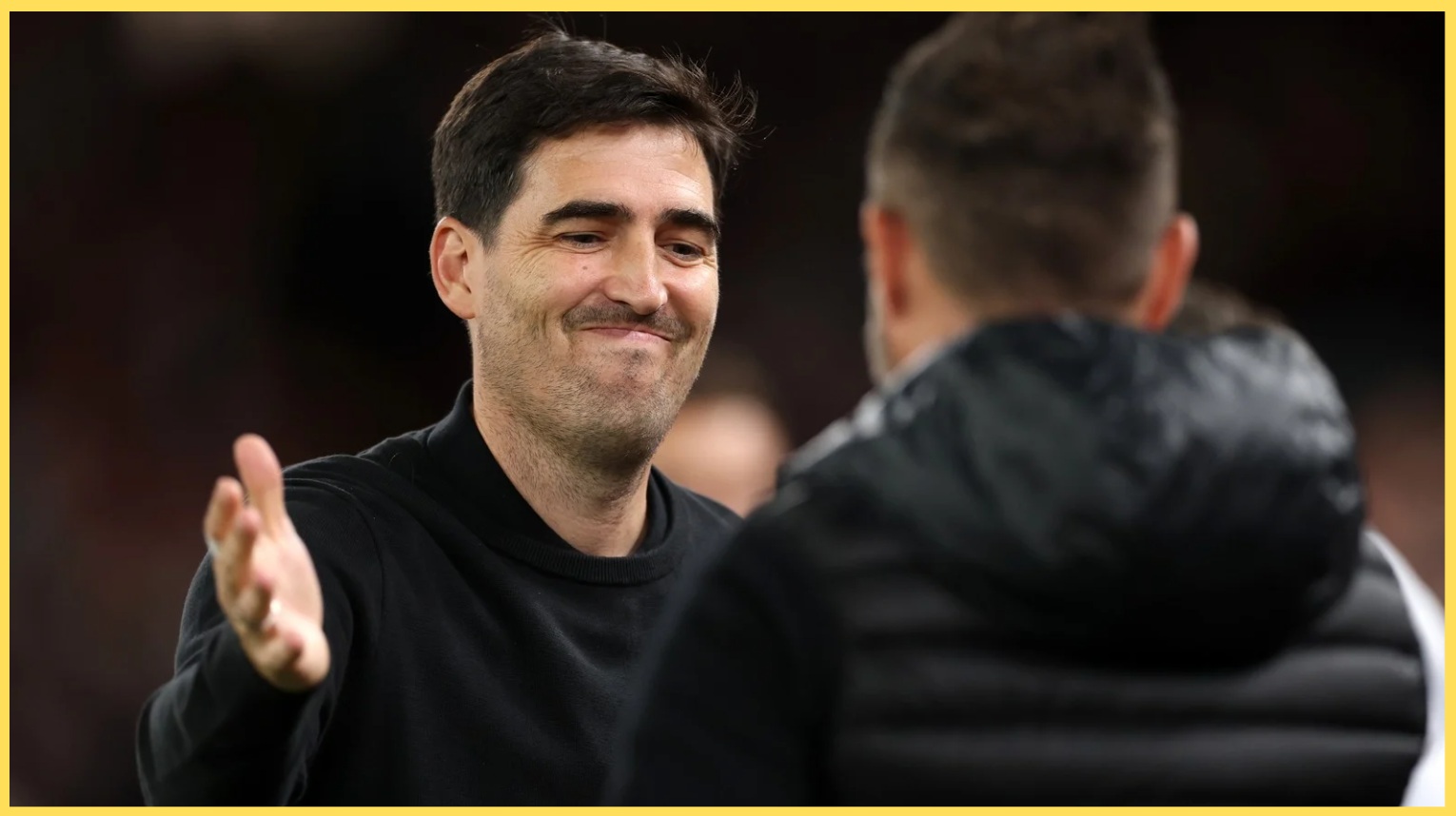 Andoni Iraola greets Roberto De Zerbi before a match at Anfield