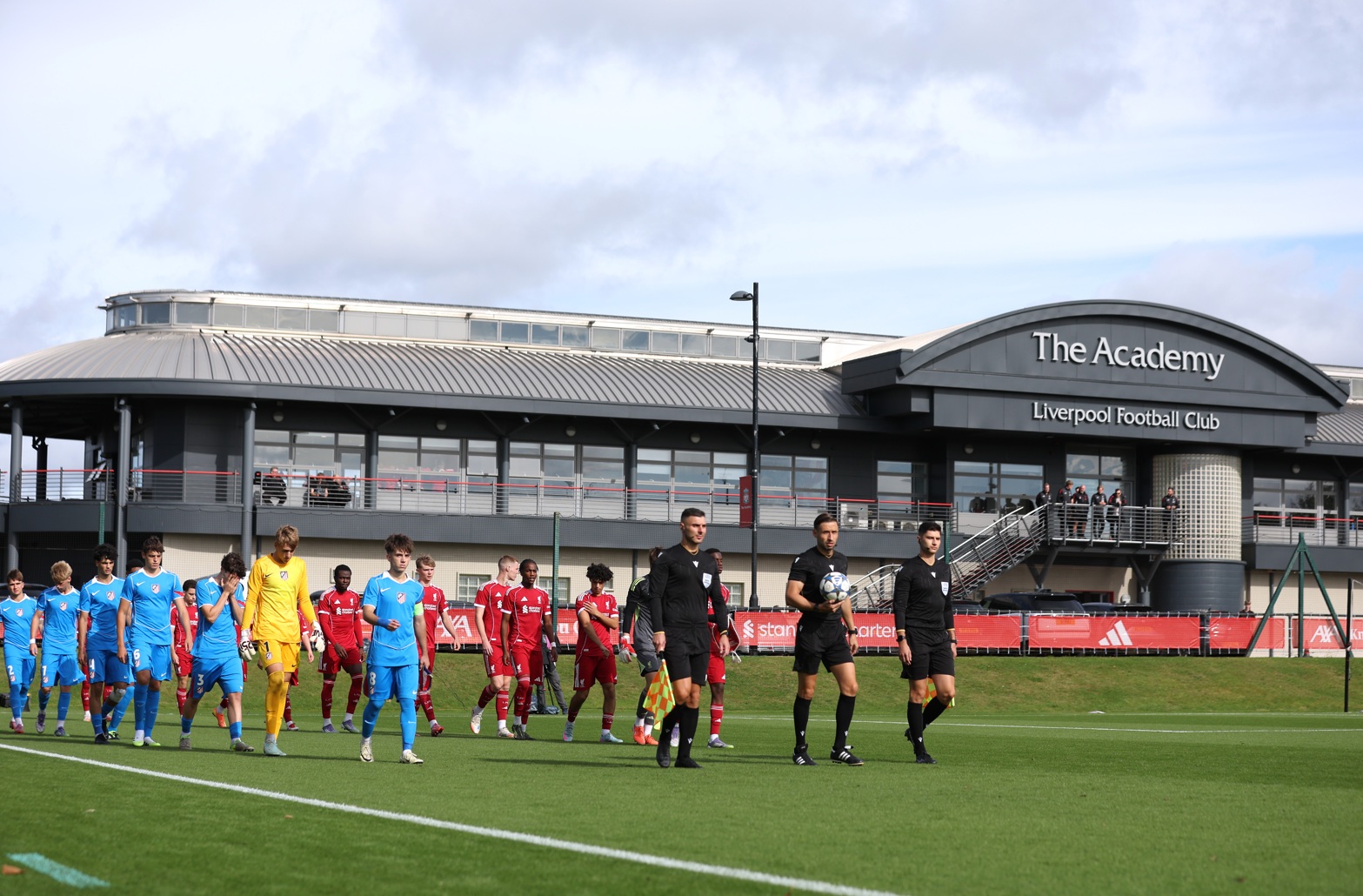 Liverpool academy players take to the pitch before a UEFA Youth League fixture at the AXA Training Centre