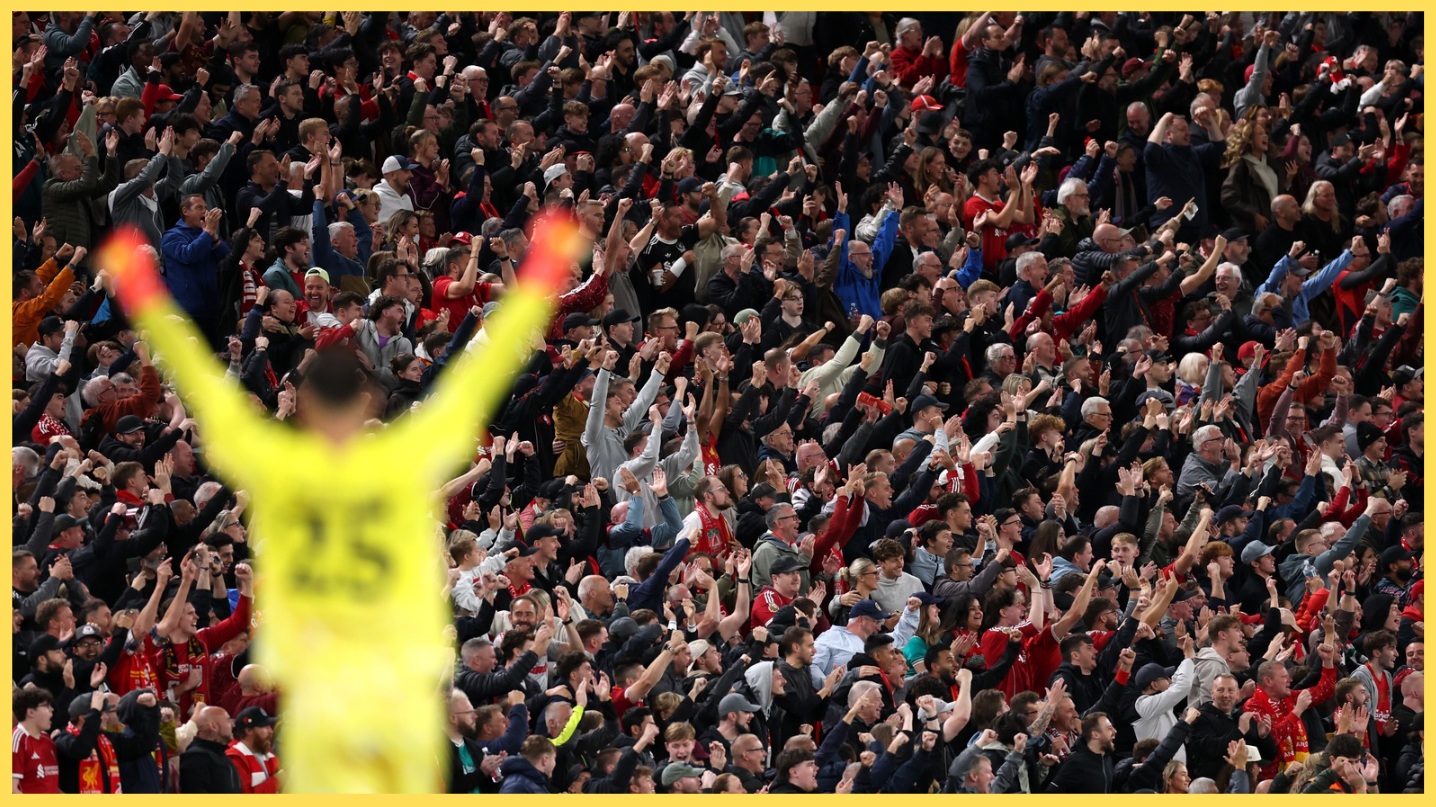 Liverpool fans cheer a goal for their team at Anfield