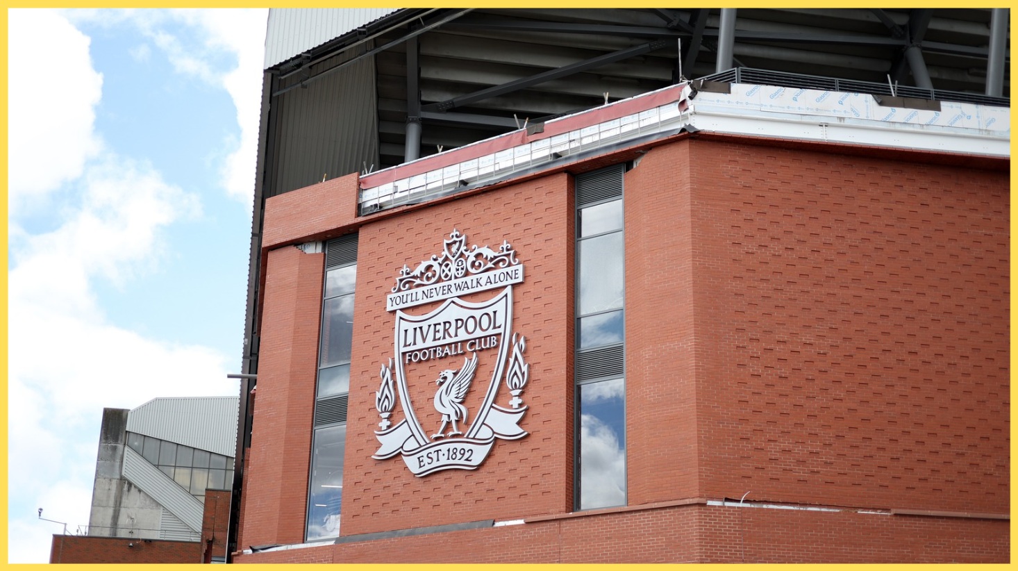 The Liverpool crest on display on the exterior wall of Anfield