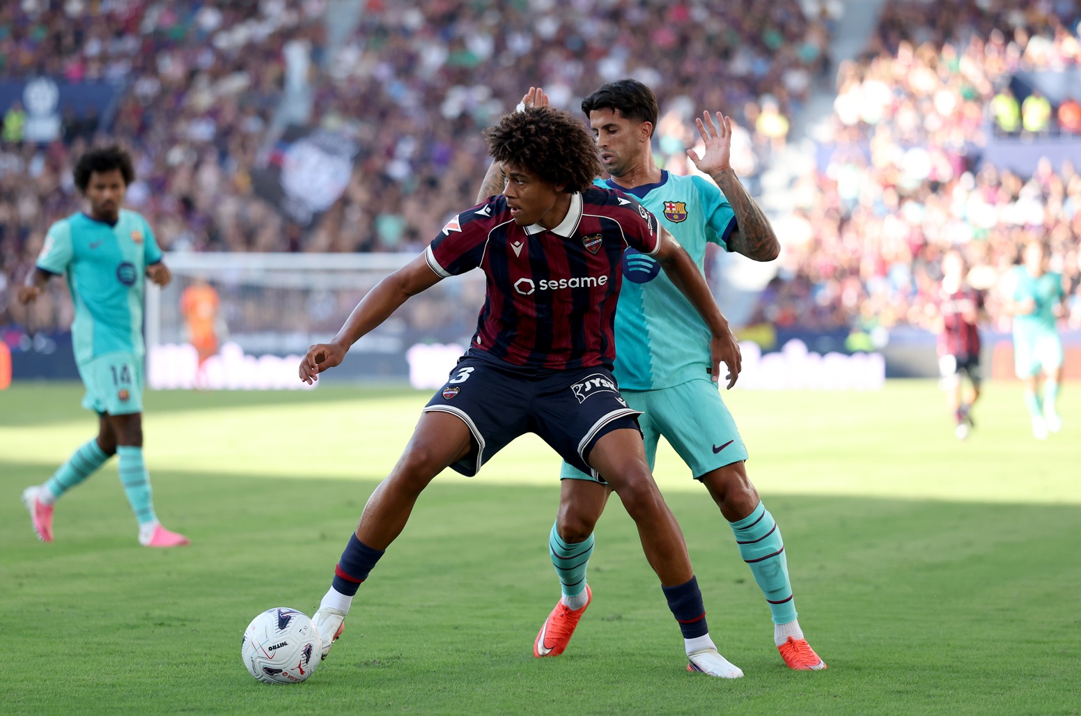 Ifeanyi Ndukwe in action for Levante against Joao Cancelo of Barcelona