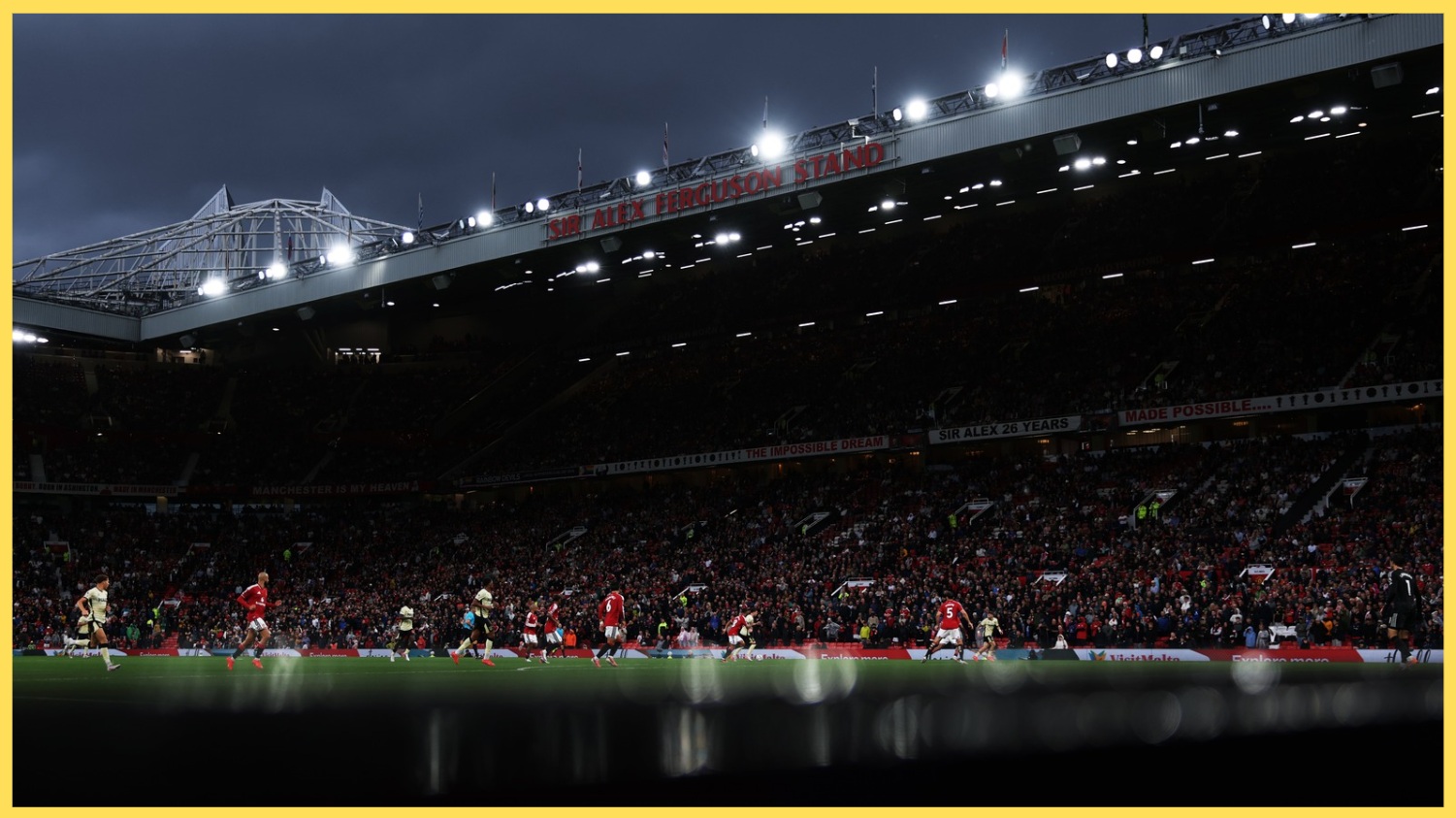 A photo of Old Trafford during a heavy storm