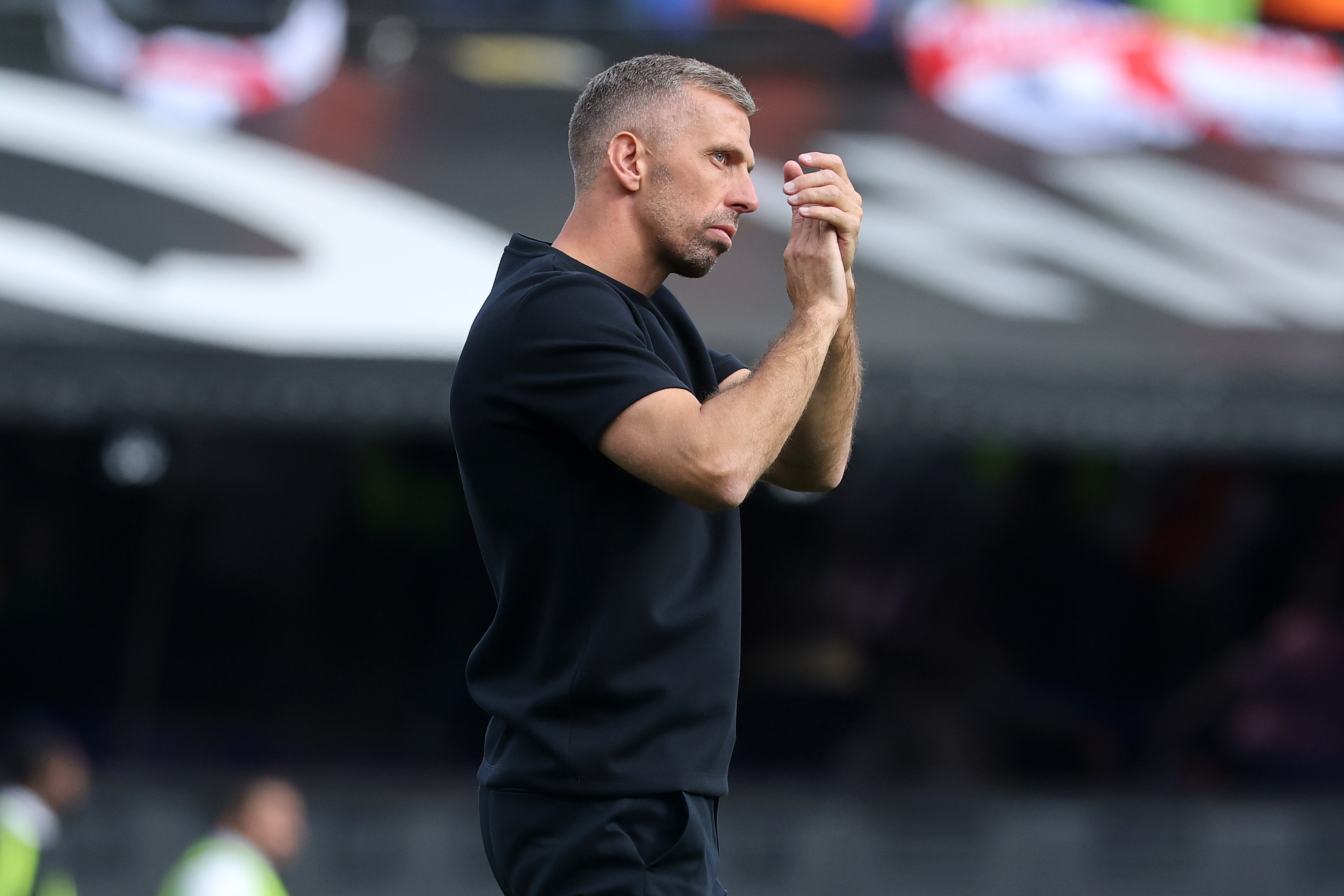 Gary O'Neil applauds from the touchline at Portman Road