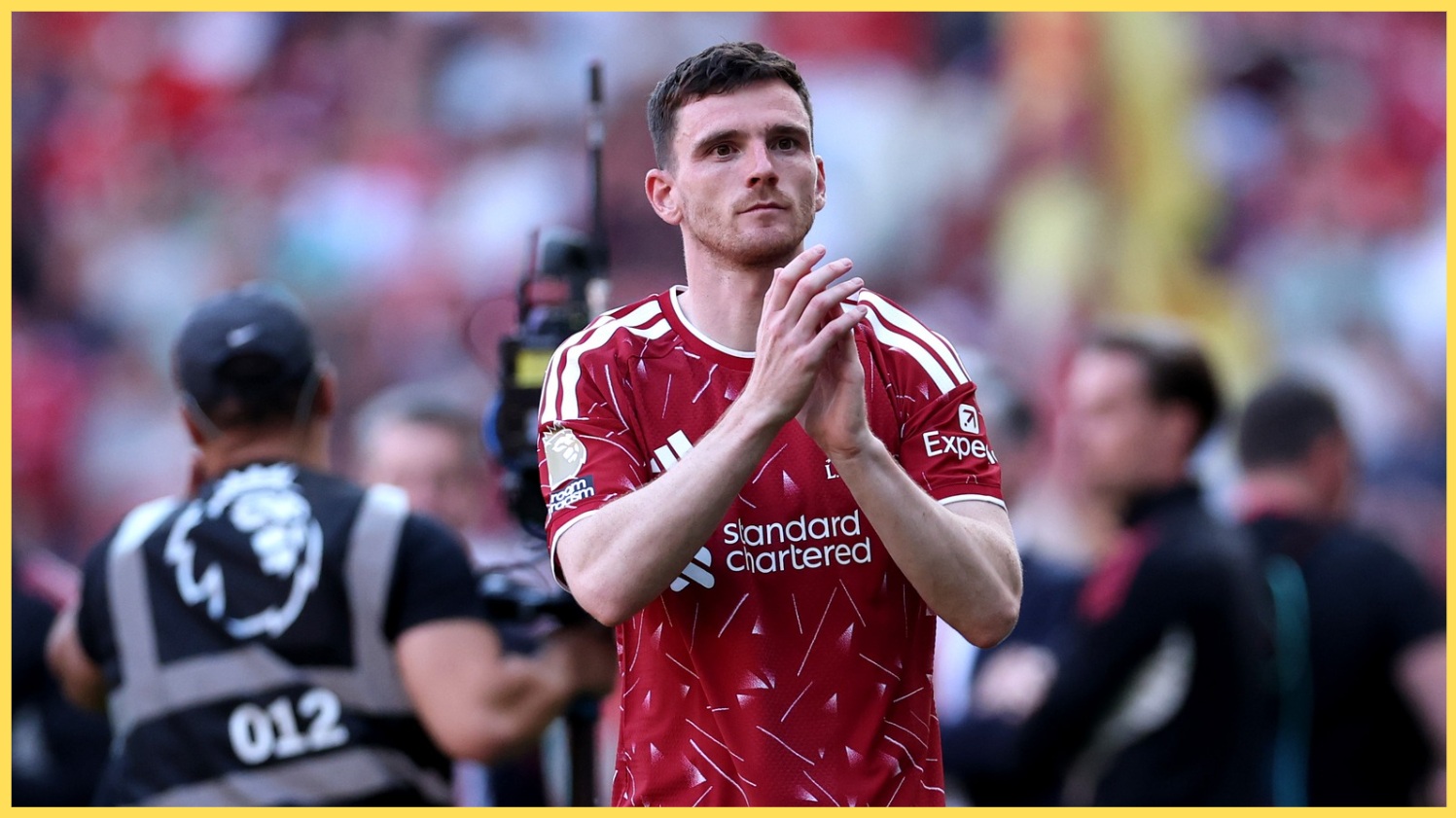 Andy Robertson applauds after his final match for Liverpool