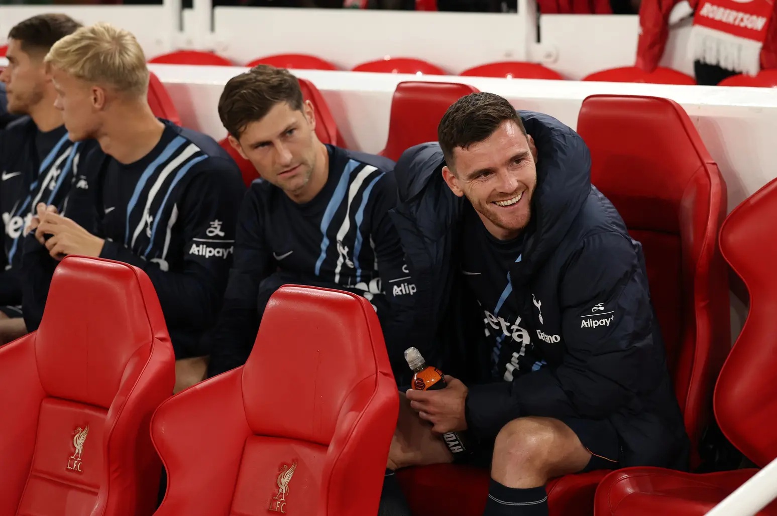 Andy Robertson pictured on the away substitutes' bench at Anfield