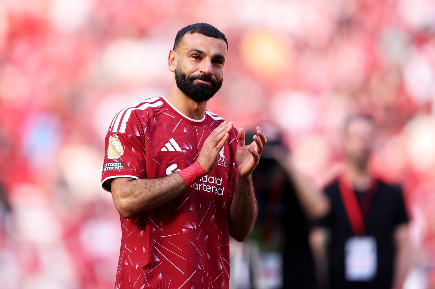 Mo Salah applauds Liverpool fans after his farewell appearance at Anfield